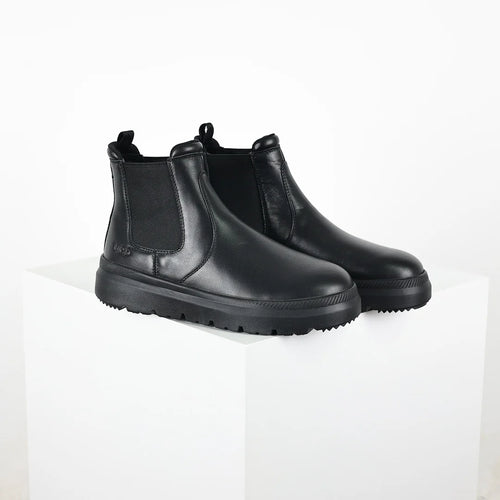 UGG Chelsea Boot – Black Leather | Warm-Lined Women's Ankle Boot with Chunky Sole