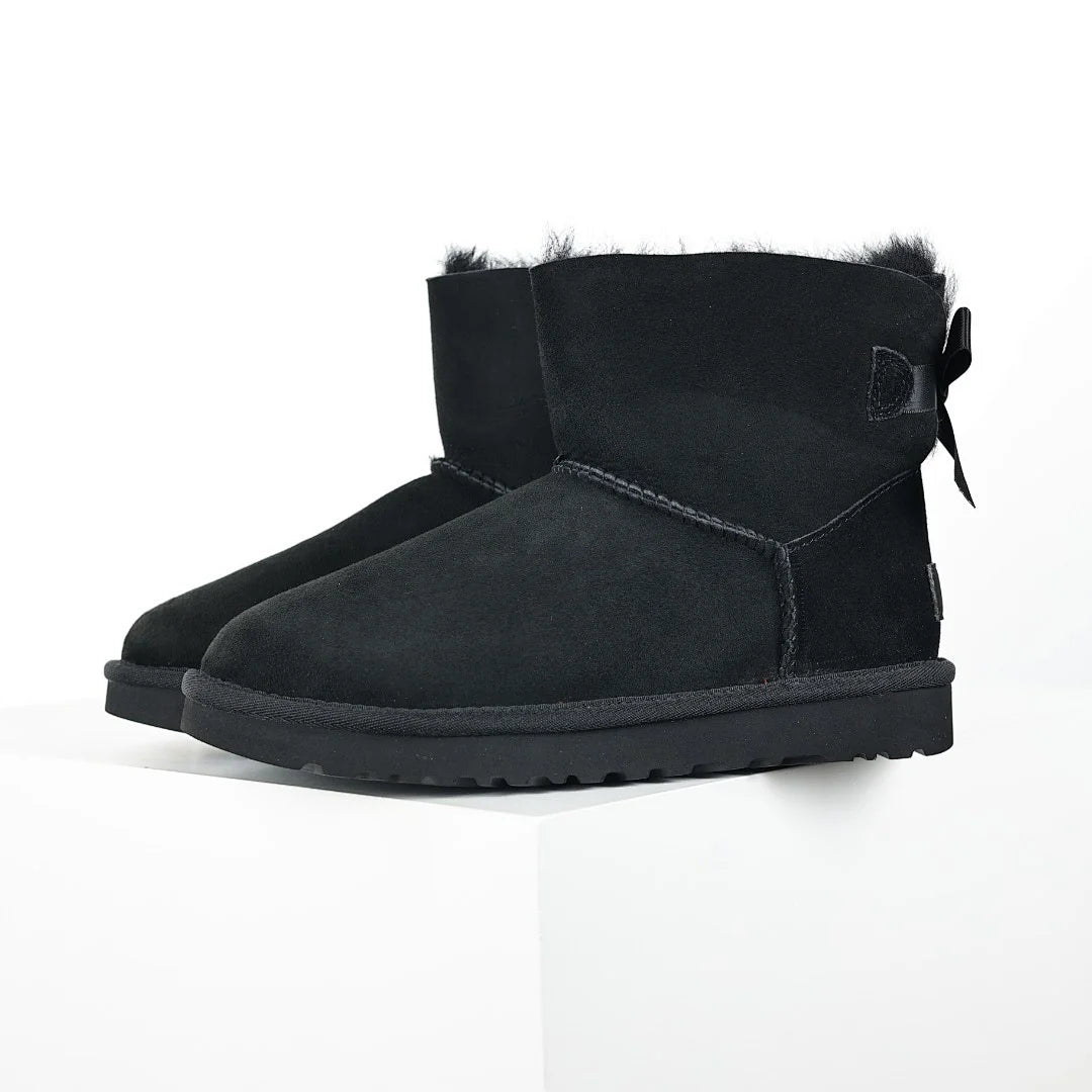 UGG Bailey Bow Mini Ankle Boot – Black | Shearling-Lined Women's Winter Boot