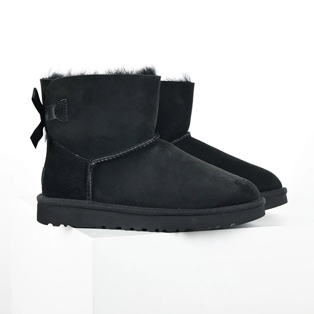 UGG Bailey Bow Mini Ankle Boot – Black | Shearling-Lined Women's Winter Boot