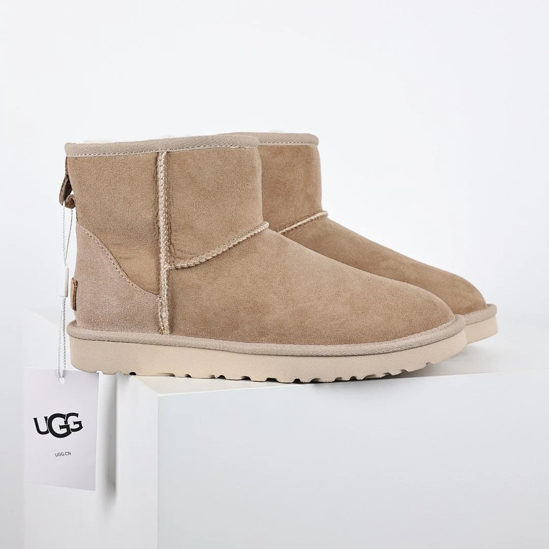 UGG Classic Mini Boot – Sand | Shearling-Lined Unisex Ankle Boot
