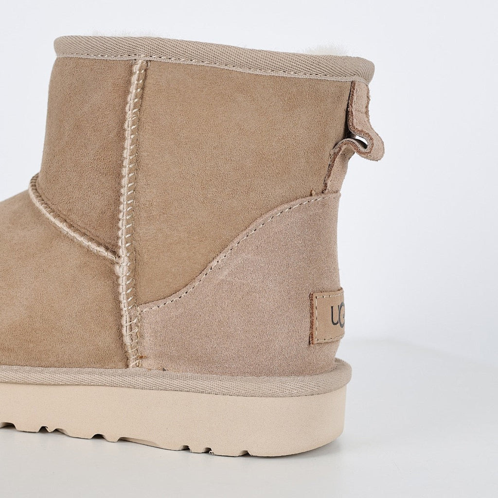 UGG Classic Mini Boot – Sand | Shearling-Lined Unisex Ankle Boot